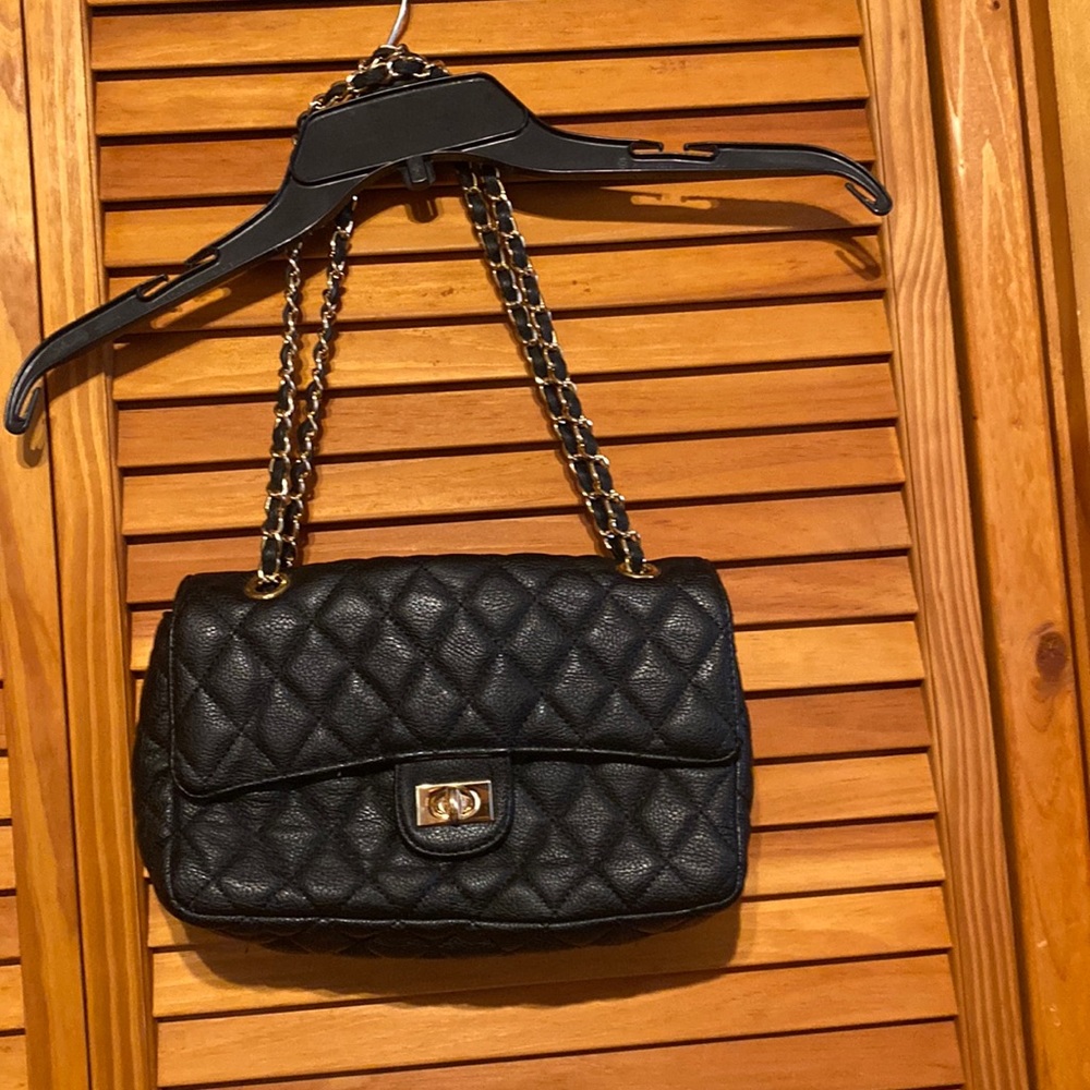Beautiful bag with gold chain handle nice luck